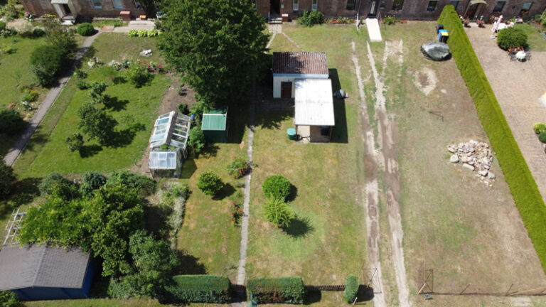 Immobilien-Uckermark_Wilsickow_Reihenhaus_Grundstück-vorm-Haus